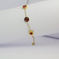 Bracelet chaîne avec 3 diamant rouge