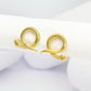 Boucles d'oreilles dorées et élégantes en forme de serpent tourné acier inoxydable