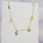 Collier doré avec symboles célestes et de protection main de fatma et œil en acier inoxydable GRACE