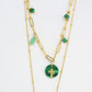 Collier double rangée soleil doré et croix verte SOL