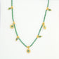 Collier bohème avec perles émeraudes et petits soleils en acier inoxydable SOLECITOS