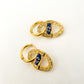 Boucle d’oreille en acier inoxydable œil bleu
